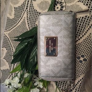 MK Jet Set wristlet.